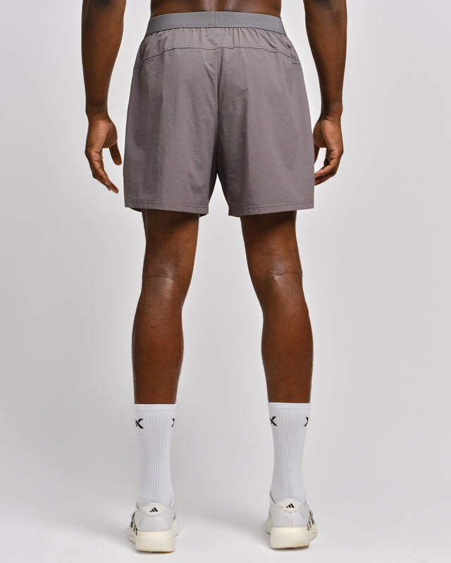 Pantalones de entrenamiento Caged Essential – Gris