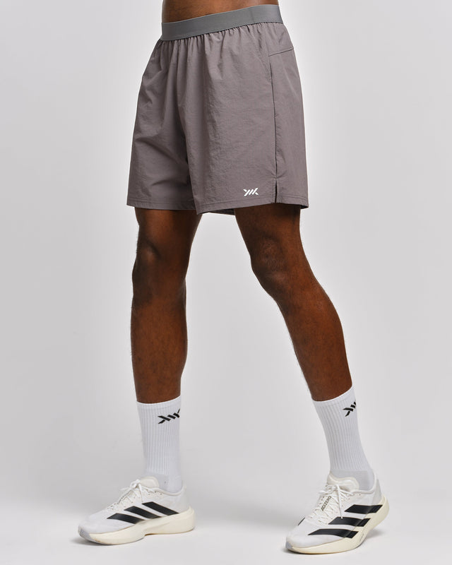 Pantalones de entrenamiento Caged Essential – Gris