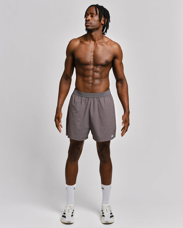 Pantalones de entrenamiento Caged Essential – Gris