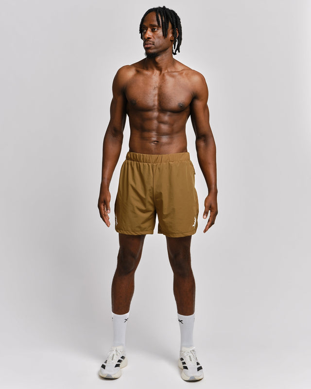 Caged Stride 2-in-1 Løbeshorts - Olivengrøn
