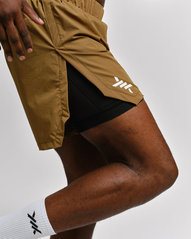 Caged Stride 2-in-1 Løbeshorts - Olivengrøn